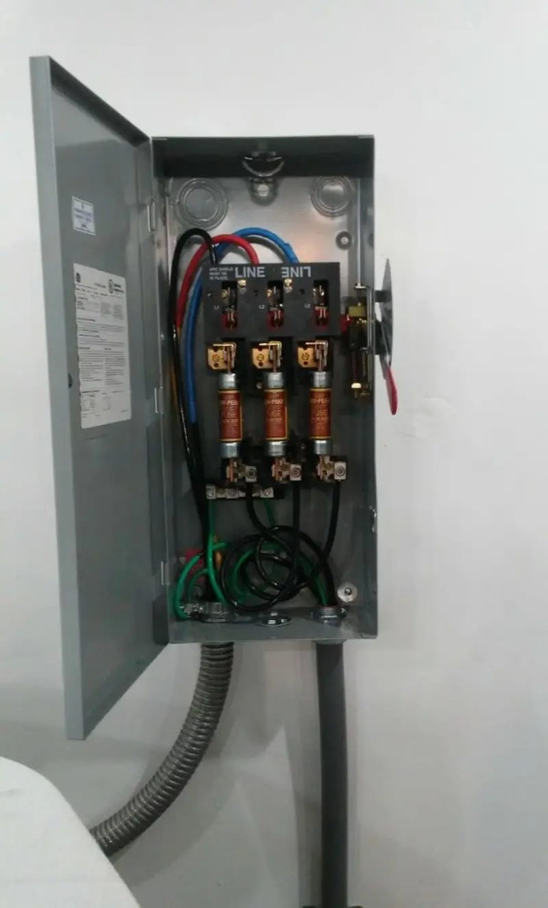 Three-phase disconnect switch installed for Smoke Detector Installation in Bal Harbour